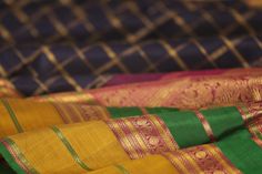 The rudraksh motif, drawn from mythology, looks striking when woven along the border of a sari as an accompaniment to the main thematic design. Sometimes bigger rudraksham motifs are woven in the body as buttis too. #kanakavalli #lovekanakavalli #kanjivaram #silk #sari #motif #varnasutra #flower #plant #handloom #india India