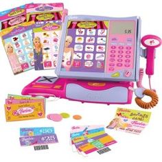 a pink toy phone with various items surrounding it on a white background, including stickers and magnets