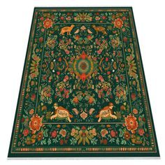 a green rug with animals and flowers on it