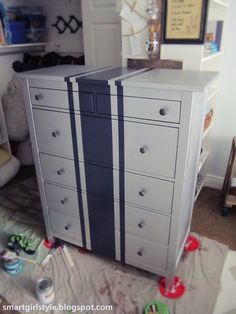 the dresser is painted gray and blue