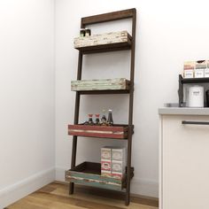 Rectangular wooden leaning shelf provides you a perfect storage solution and offers a clean and comfortable living space. This item ships in 1 carton. Suitable for indoor use only. This item ships fully assembled in one piece. Maximum weight limit is 30 lbs. This is a single brown colored display shelf. Fir shelving unit features 5 shelves. Farmhouse style. Grayson Lane Brown Distressed Wood 4-Shelf Ladder Bookcase (23-in W x 70-in H x 18-in D) | 84256 Wooden Ladder Shelf, Leaning Shelf, Blue Drawers, Space Gift, Ladder Shelf, Wood Drawers, Living Styles, Rustic Living, Display Shelf