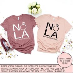 two t - shirts that say nola and have diamond rings on the front, one with