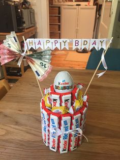 a birthday cake made to look like it is in the middle of a kitchen table