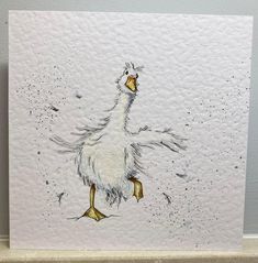 a card with a drawing of a white bird on it's back legs and feet