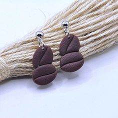 Coffee Bean Embossed Dangle Earrings. Handmade Item. Materials Used: Polymer Clay, Stainless Steel Findings Durable & Lightweight Easy To Clean Perfect For: Everyday Wear, Casual, Office, Work, School, Barista Clay Keychain, Vintage Drop Earrings, Red Heart Earrings, Contemporary Earrings, Chunky Hoop Earrings, Gold Statement Earrings, Coral Earrings, Handmade Wire Wrapped, Bow Earrings