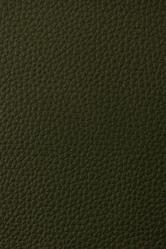 the texture of an olive green leather background