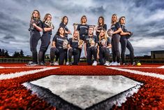 the softball team is posing for a photo