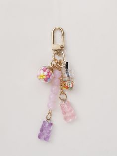 a key chain with charms attached to it