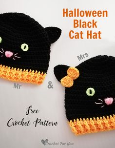 two crocheted black cats hats with green eyes