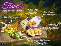 there are many different types of food on the table and in front of it is a sign that says tiara's taste of new orleans