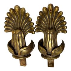 pair of brass peacock head wall sconces