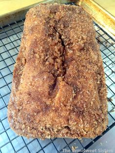 a loaf of bread sitting on top of a cooling rack