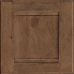 a close up view of a wooden cabinet door