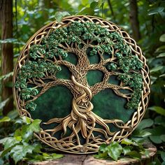 the tree of life is made out of wood and has green leaves on it's sides