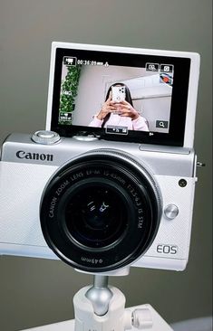 a digital camera is being used to take pictures