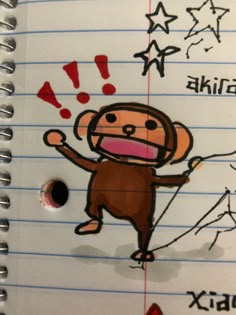 a drawing of a monkey on lined paper