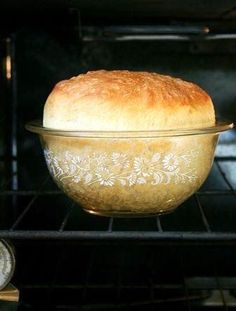 the bread is being cooked in the oven and then put into the pot for baking