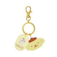 a keychain with an animal on it and a tag attached to the front