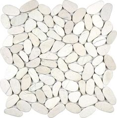 white pebbles arranged in a circle on a white background