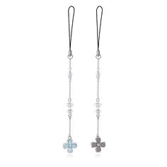 pair of earrings with chain and flower design