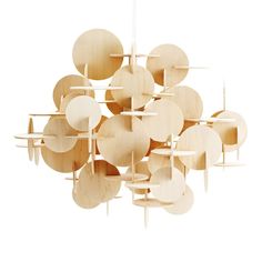 a wooden chandelier hanging from the ceiling with multiple circles and shapes on it