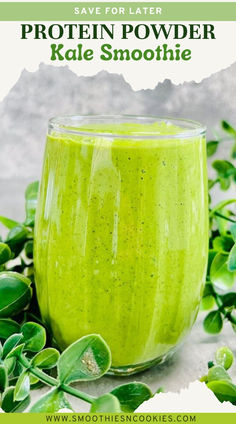 a green smoothie in a glass with leaves around it and the text save for later protein powdered kale smoothie