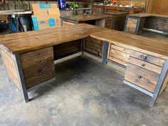 an office desk made out of wood and metal