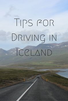 a road with the words tips for driving in iceland on it and mountains in the background