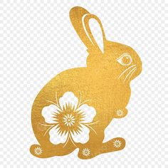 a golden rabbit with flowers on it's back