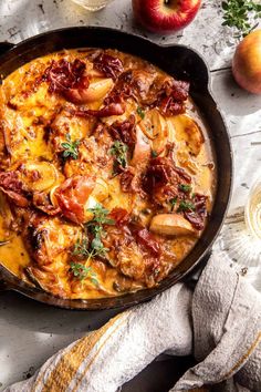 a skillet filled with food on top of a table