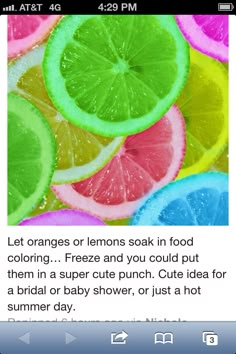 a bunch of lemons and lime slices are arranged in the shape of a rainbow