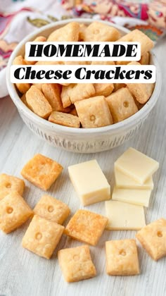 homemade cheese crackers in a bowl on a table with the words, homemade cheese crackers