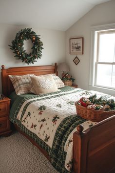 a bedroom with a christmas wreath hanging on the wall and a bed in front of it