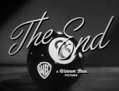 the end logo on top of a bowling ball in front of a black and white background