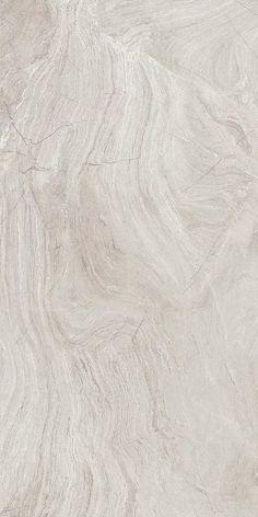 a white marble textured surface with grey streaks