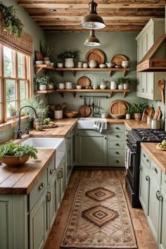 a kitchen filled with lots of green cabinets and counter tops next to a stove top oven