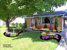 a house with landscaping in the front yard