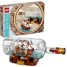 a lego ship in a bottle with its lid open and it's contents inside