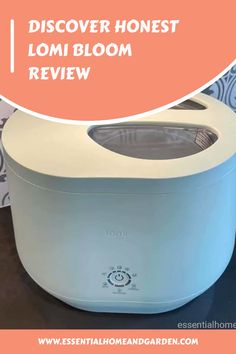 an electric rice cooker sitting on top of a table with the words, dissover honest lomi bloom review