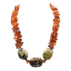 Vintage large freeform baltic honey amber bead necklace featuring sterling silver beaded rondelles as well as an adjustable sterling silver lobster clasp.  The amber is accented by 3 large black and green stones.  The necklace can be adjusted from 17" to 18.40".  The amber beads are approximately .75" wide. White Amber Necklace, Stone Bead Necklace, Amber Bead Necklace, Beaded Jewelry Bracelets, Beaded Necklace Diy, Green Stones, Turquoise Bead Necklaces, Stone Beaded Necklace, Handcrafted Artisan Jewelry