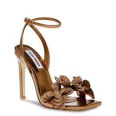 Shimmering rhinestone-accented flower embellishments on the toe strap add a dazzling touch to these women's Steve Madden Ulyana bronze (gold) high heel evening sandals. Made of synthetic upper with a metallic finish, these dressy sandals have a trendy square open toe and an adjustable ankle strap with buckle closure for a precise fit. Synthetic lining and a lightly padded footbed cradle your feet while the synthetic sole offers grip. A towering stiletto heel lends a major style boost. | Steve Ma Butterfly Heels, Ankle Wrap Heels, Steve Madden Heels, Evening Sandals, Wrap Heels, Gold Heels, 4 Inch Heels, Dress Sandals, Casual Sandals