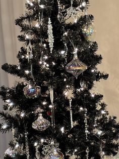 This Glam and Chic Tree will make a gorgeous addition to your annual holiday tradition.  The gem ornaments, crystal ornaments, and glass ornaments add an extra shine and sparkle to your Christmas Tree. Turn your Christmas tree into true elegance.  Chic and beautifully decorated with tons of crystal drop ornaments, diamond drop ornaments, pearl drop ornaments, and beautiful glass ornaments.  This tree is definitely a 2024 trend.   Ornaments are hooked and ready to go. Each piece is organized in a way that is easy and ready for anyone to assemble. This was designed on a 6.5 ft black Christmas tree.  The tree is not included.  The tree in the picture is decorated with the front being the focal point (the back of the tree is not decorated).  I would recommend purchasing two kits if people will Crystal Ornaments Christmas Tree, Crystal Christmas Tree Decorations, Gem Ornaments, Pearl Christmas Tree, Pearl Christmas, Fresh Snowfall, Christmas Tree Kit, Tinsel Christmas Tree, Crystal Christmas Tree