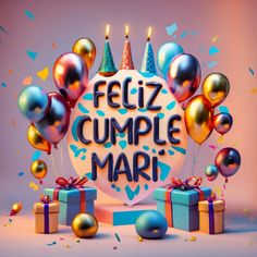 a birthday cake surrounded by presents and confetti with the words feliz cumple mari