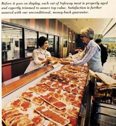 two women are working in a pizza shop, one is serving the other some food