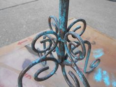 an old rusty metal object on the ground