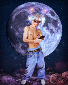 a shirtless man holding a cell phone in front of a full moon with stars