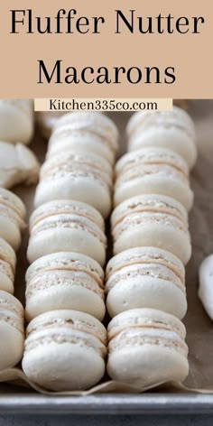 a pan filled with lots of different types of macarons