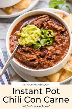 instant pot chili con carne with shredded beef and avocado in a white bowl