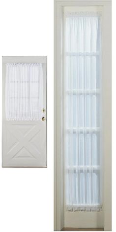 a white door and window with sheer curtains