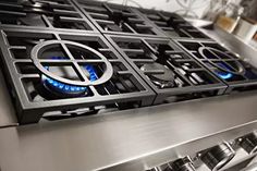 the gas burners on this stainless steel stove are blue